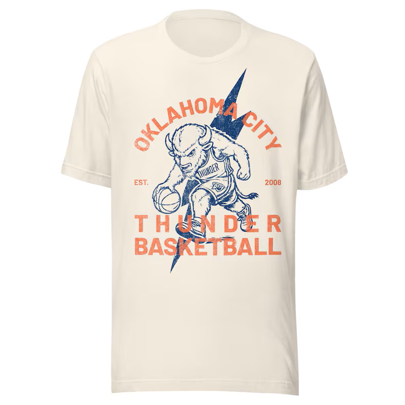 Cream T-shirt with Oklahoma City Thunder Basketball text, a bison basketball player, and a blue lightning bolt